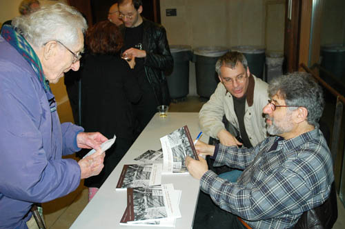 Clarence Kailin getting a copy of book from author Richard Bermack