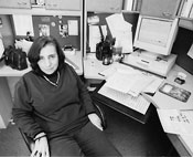 social worker at desk looking upset