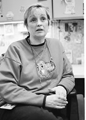 Lor Nelson sitting at a desk looking tired