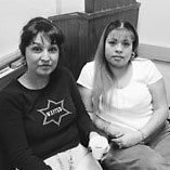 Two women looking concerned