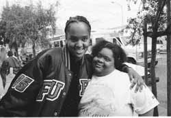 two people with disablities posing for the camear