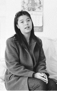 Social worker with a chinese calendar in the background