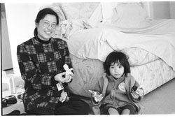 Social worker Cheng playing with a young child