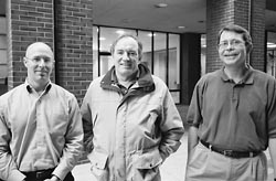 Dan Passamaneck, Mike Maacks, and Scott Williams standing infront of the state bar office building