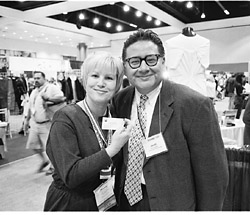 Socai worker Jacob Ocampo standing next to a happy parent