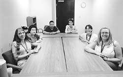 Alta Union Tema sitting arounda table