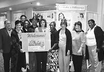 Tamika Bennett speaking with tears in her eyes, behind her is sharon davis , Dion Aroner and Annette Jeffries