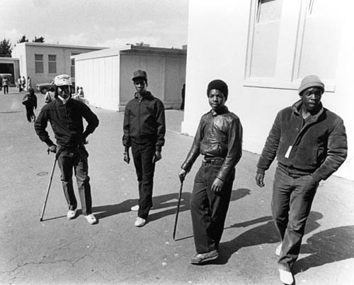 4 boys posing as part of a dance group